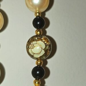 Elegant Gold and Black Beaded Necklace